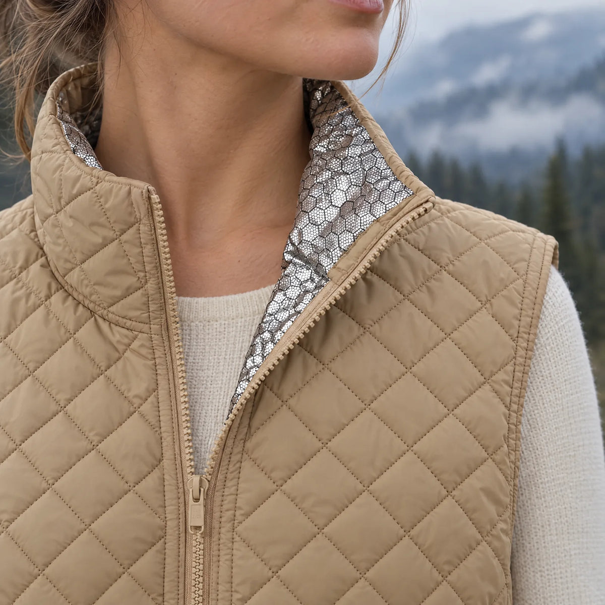 Stand-up collar of the women's heated vest with honeycomb silver lining